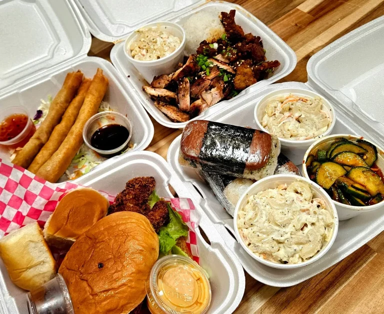 Hawaiian Style BBQ, Augusta, GA: hawaiian plate lunch takeout boxes with spam musubi, grilled/teriyaki meats, mac salad, fried chicken sandwich, egg rolls, and pickled cucumber salad